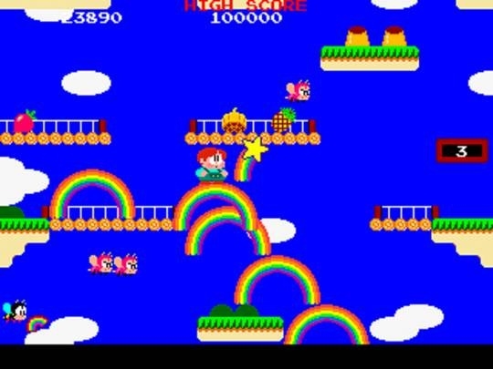 Screenshot from Rainbow Islands, a 2D platformer.  There are many colorful rainbows and a deep blue sky in the background.